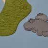 Ткань с краш-эффектом изображает зеленый остров на детском панно